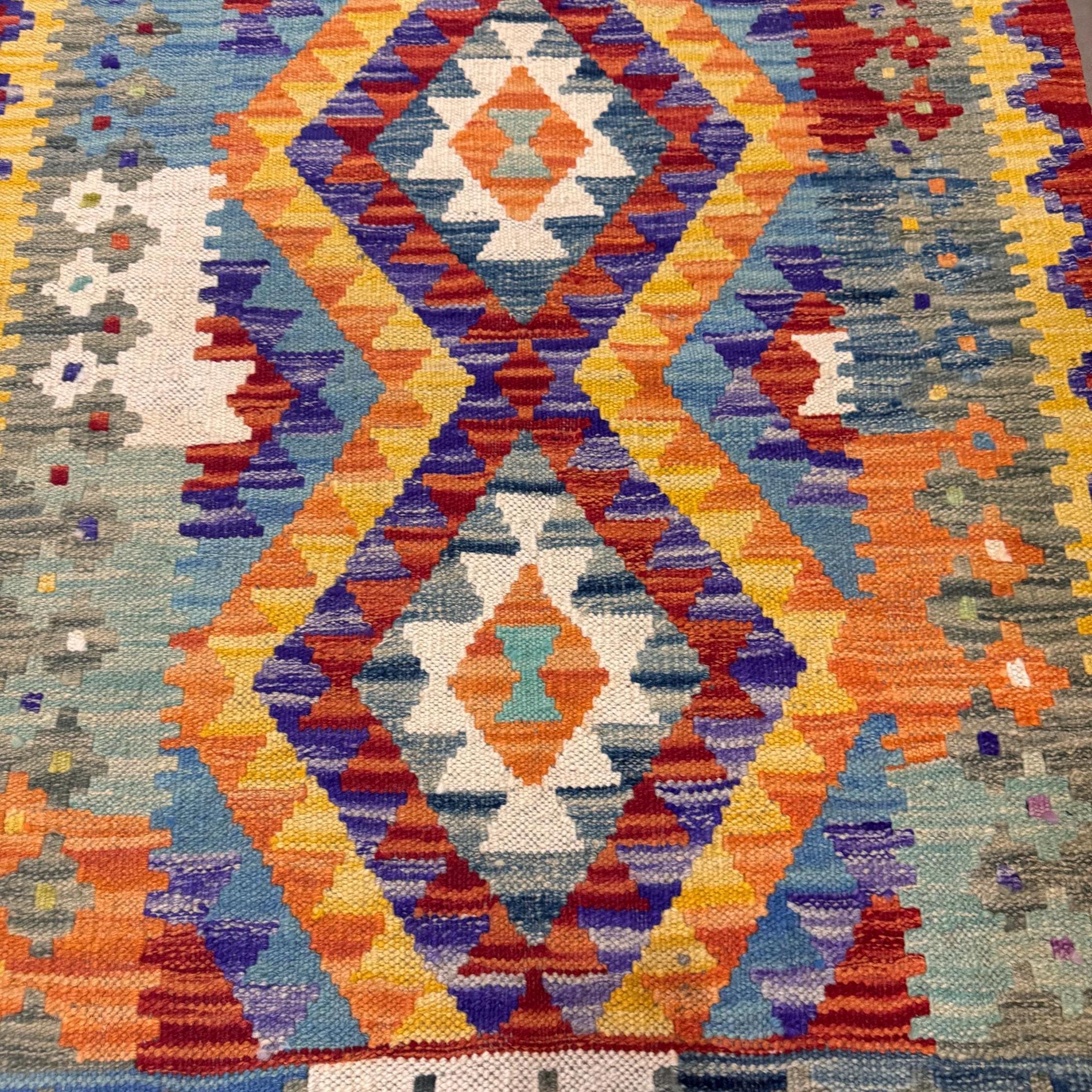 Handwoven Wool Kilim Rug – Colorful Geometric Afghan Design (113 x 85 cm)